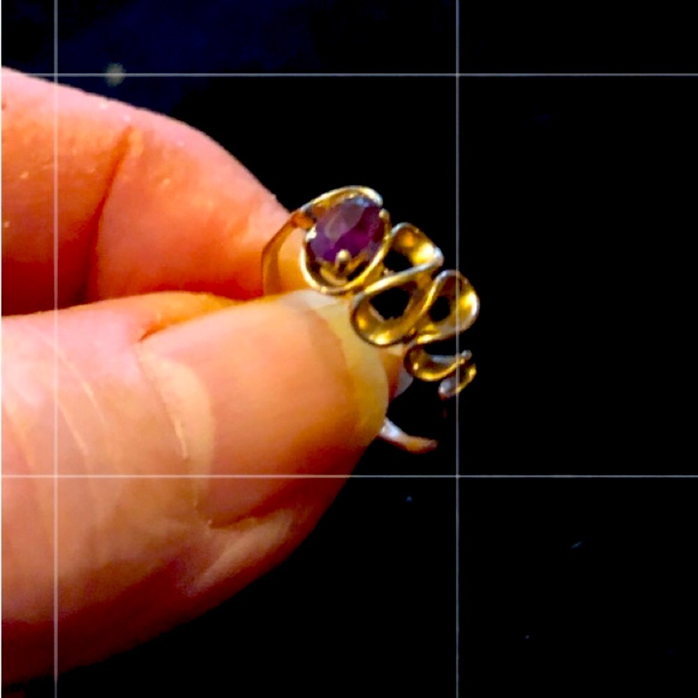 Size 4 1/2 14k deco ring with amethyst.  Modern look that blends with classics.